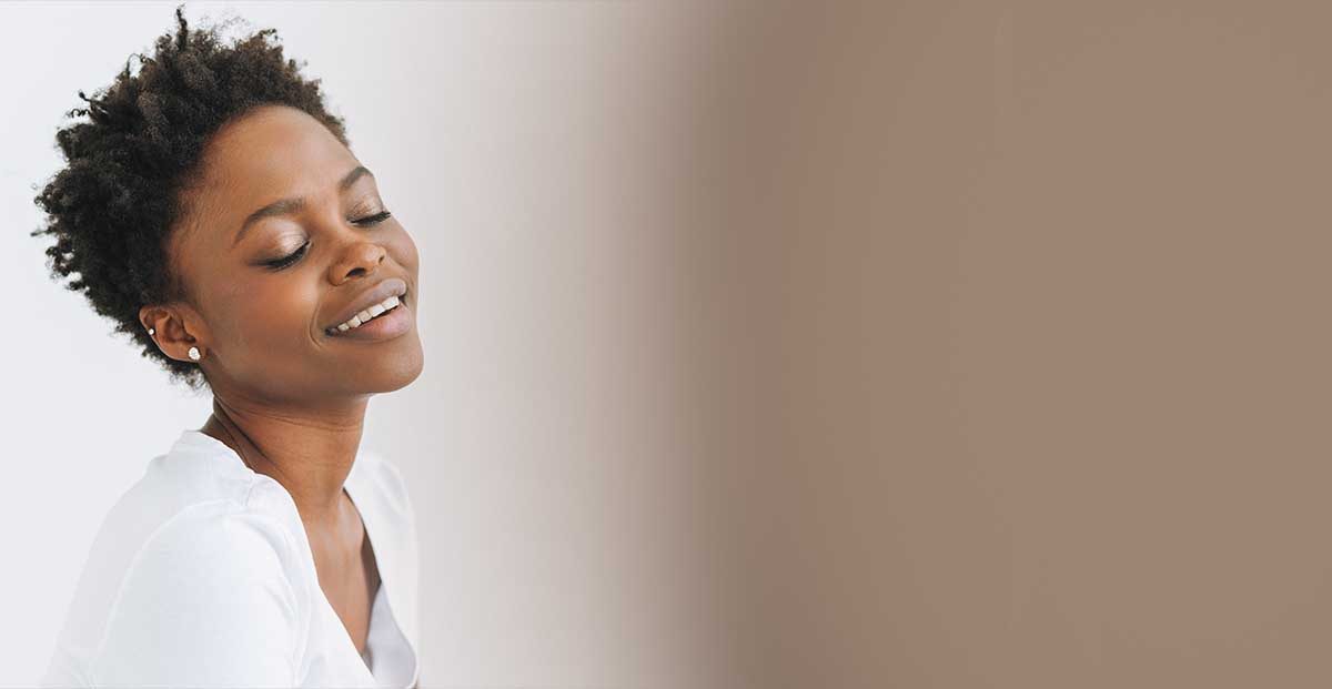 Woman with glowing skin after a facial